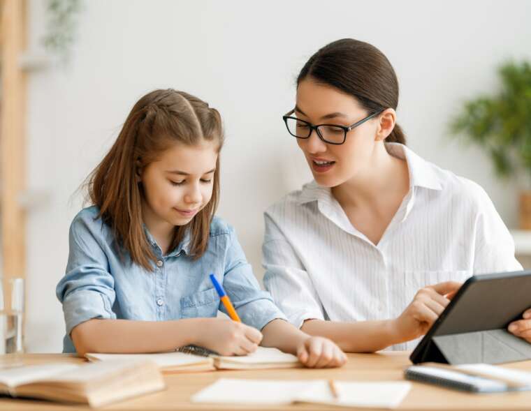 Girl doing homework or online education.